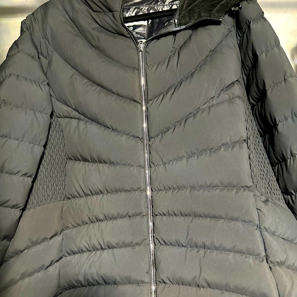 Black hooded Bernardo down jacket with attached Bag in the inside lining
